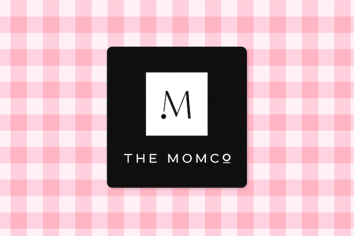The MomCo logo